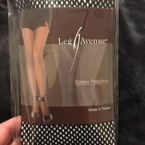 Black fishnet stalkings, new in package, one size